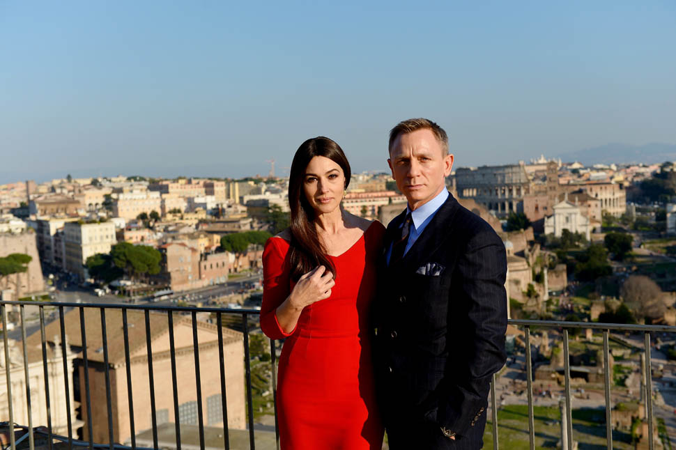 Italian actress Monica Bellucci and British actor Daniel Craig pose during a photocall to promote the 24th James Bond film 'Spectre' on February 18, 2015 at Rome's city hall.   AFP PHOTO / TIZIANA FABI        (Photo credit should read TIZIANA FABI/AFP/Getty Images)