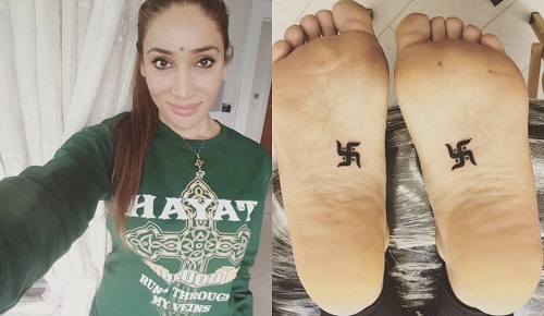 Black Jain Swastik Tattoo On Ankle