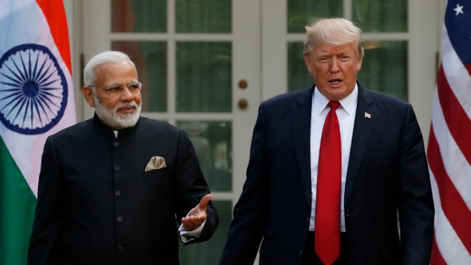 Image result for Modi and Trump adoring their flags in rally