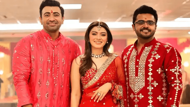Hansika Motwani dresses up in red and grooves with fiancé Sohael Kathuriya.